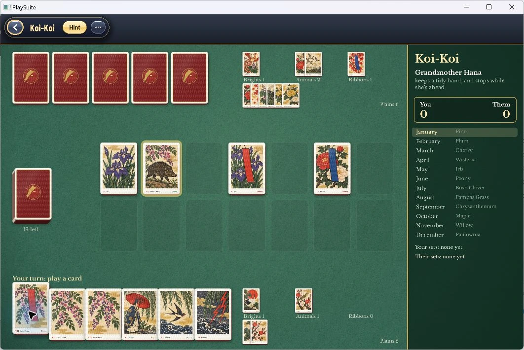 Koi-Koi in progress with illustrated hanafuda cards on the table.