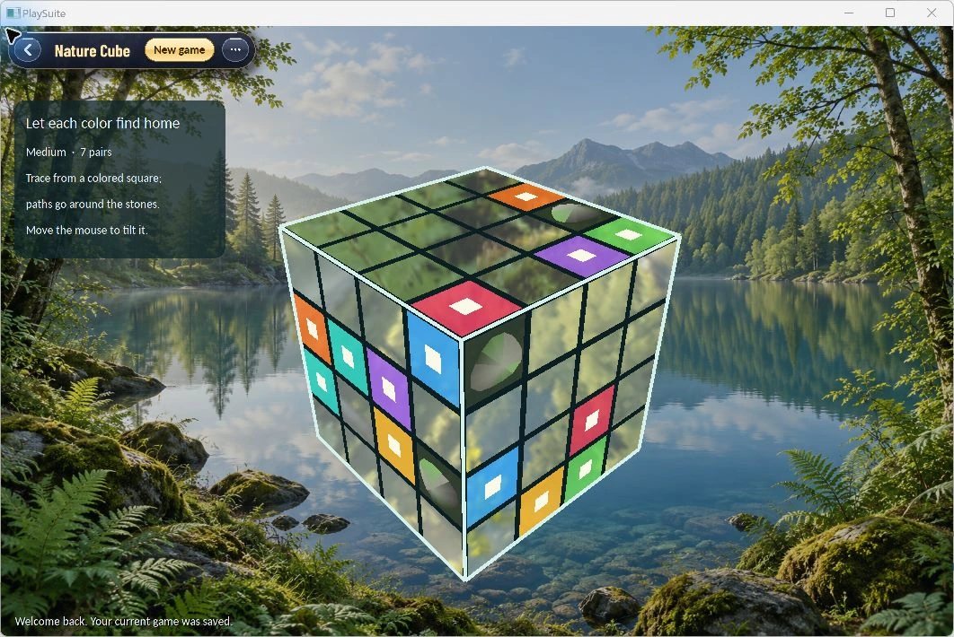 Three mirrored faces of Nature Cube showing colored path endpoints against a lake.